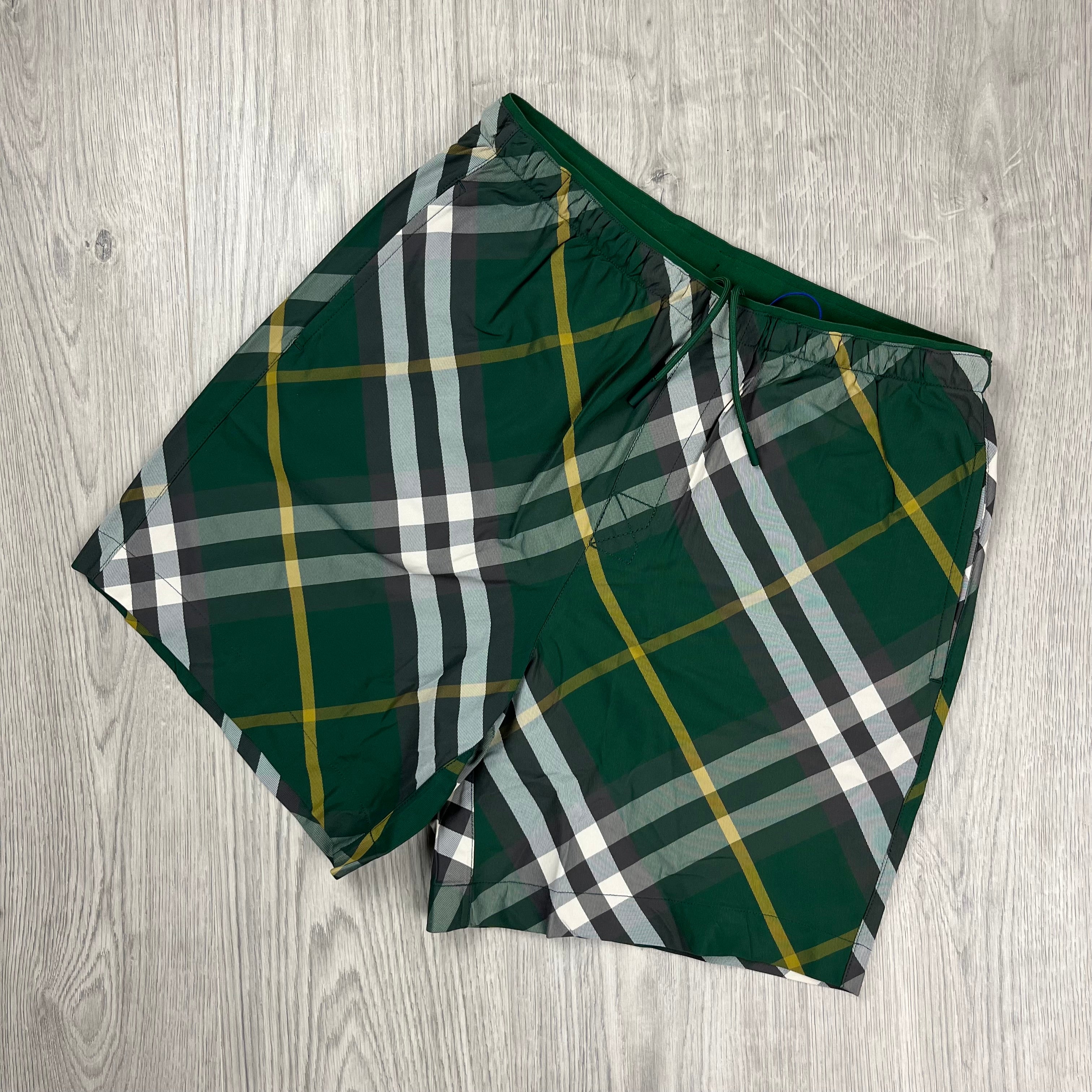 Burberry EKD Check Swim Shorts in Ivy Green. On sale at Open Attire.