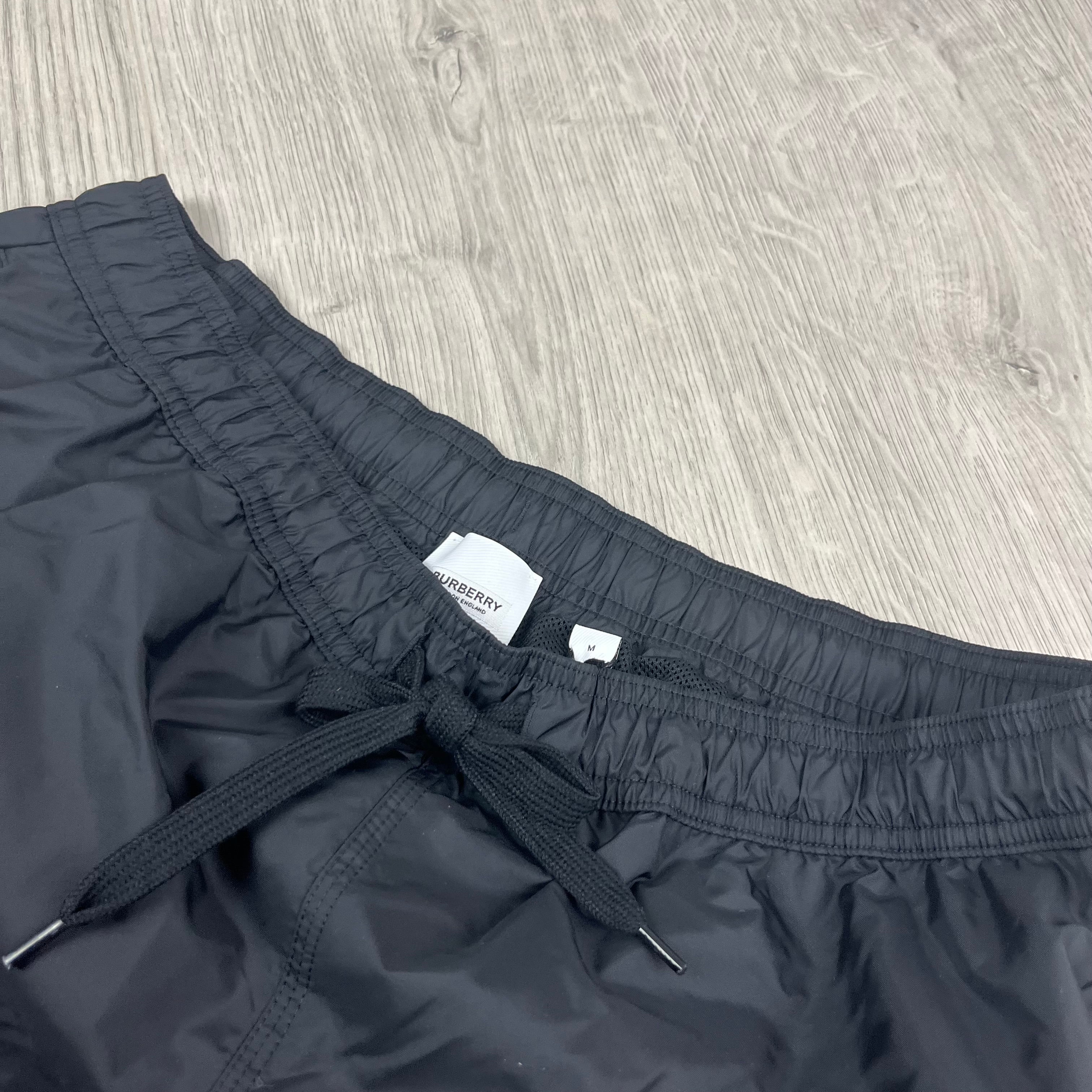 Burberry 'Martin' Swim Shorts in Black. On sale at Open Attire.