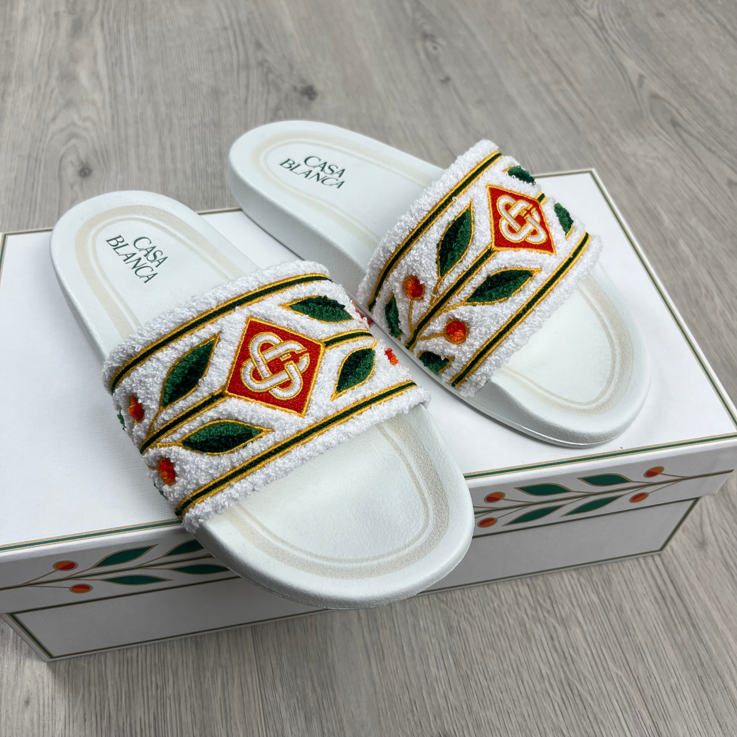 Casablanca Paris Terry Cotton Laurel Slides in White. On sale at Open Attire.