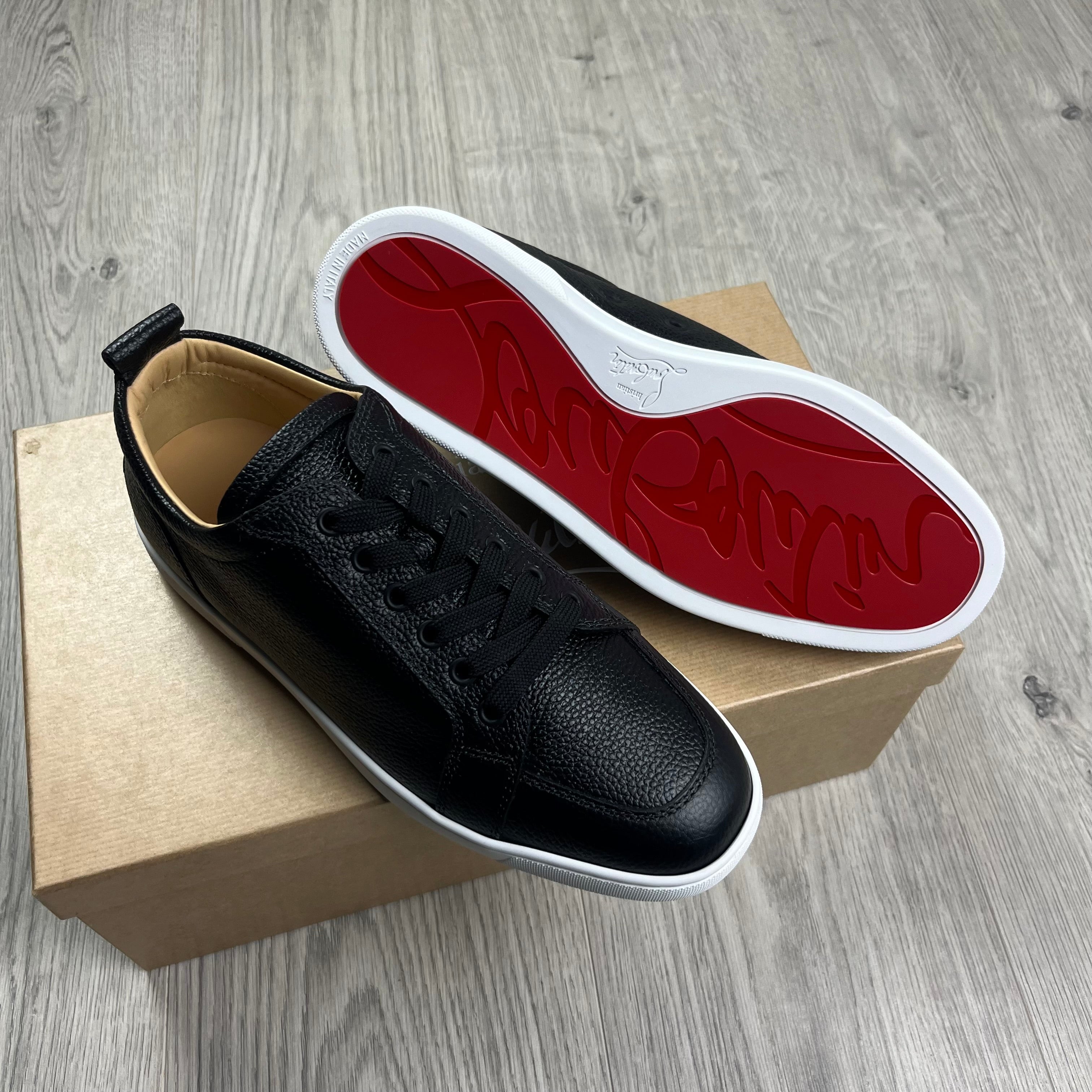 Christian Louboutin Rantulow Sneakers in Black. On sale at Open Attire. 