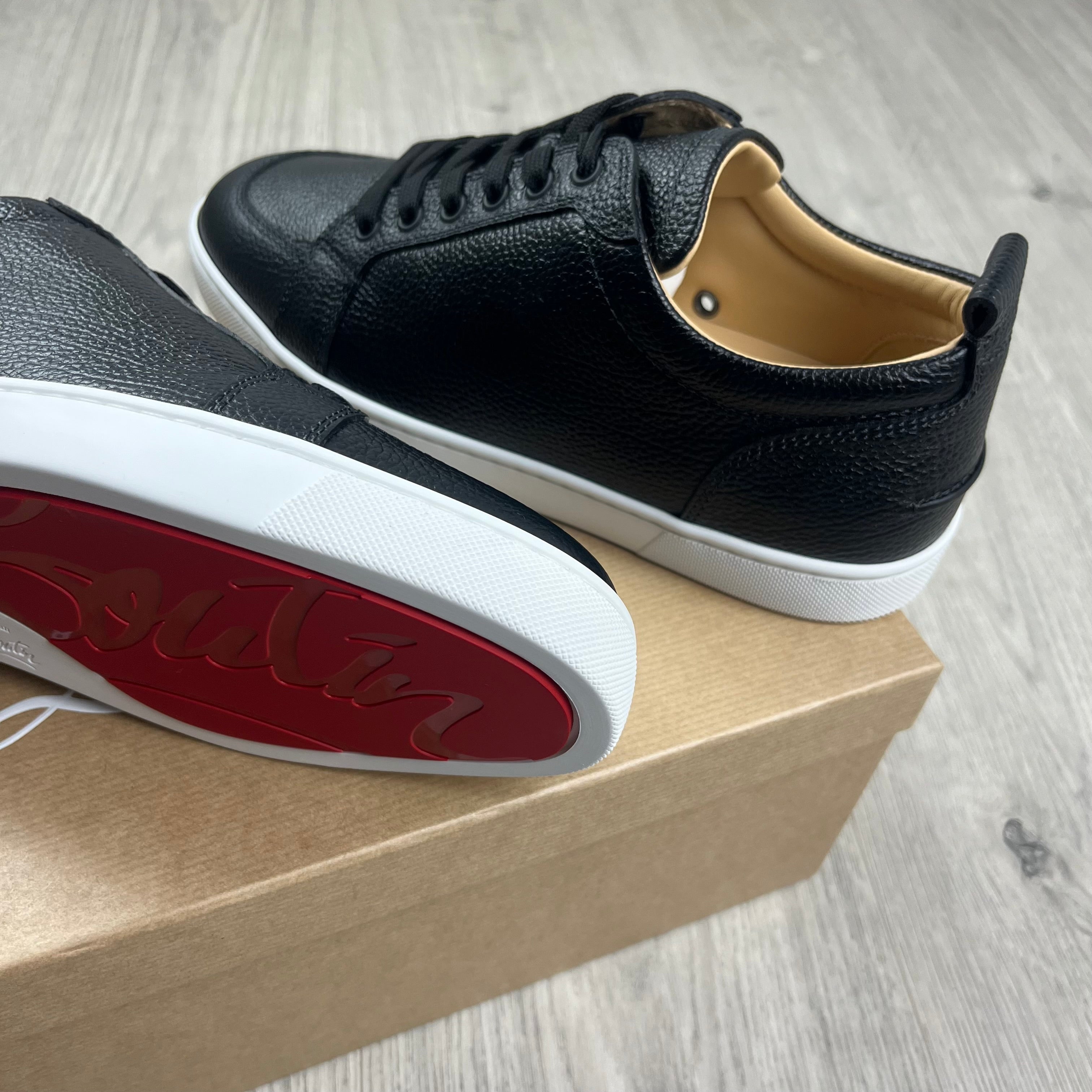 Christian Louboutin Rantulow Sneakers in Black. On sale at Open Attire. 