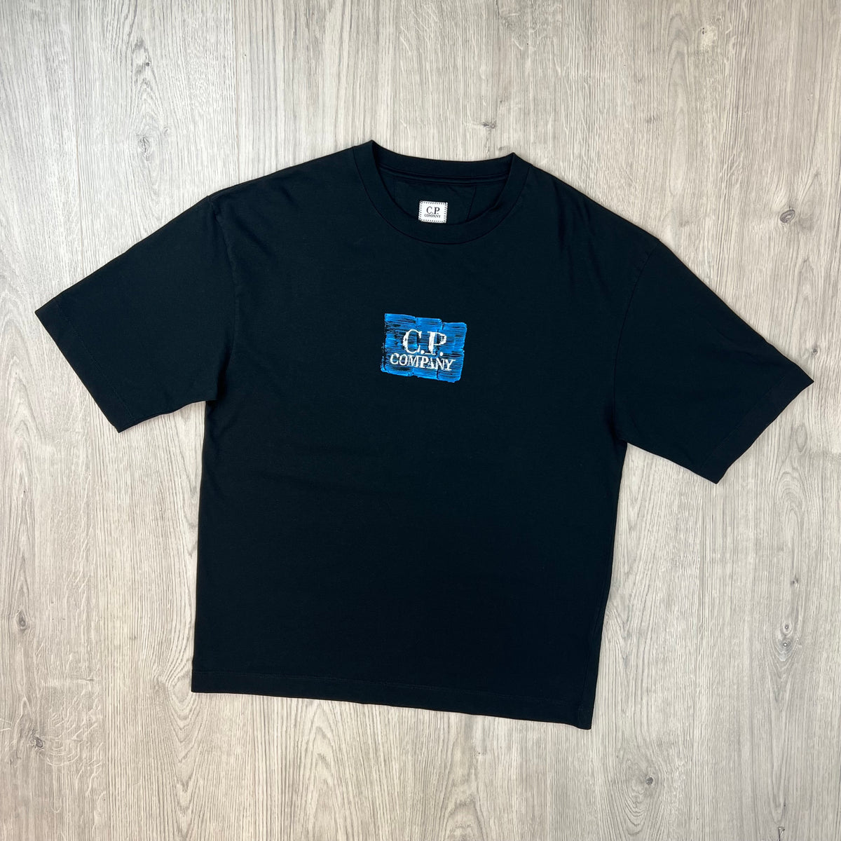 Front view of the CP Company 30/1 Jersey Graphics T-Shirt in Black. 
