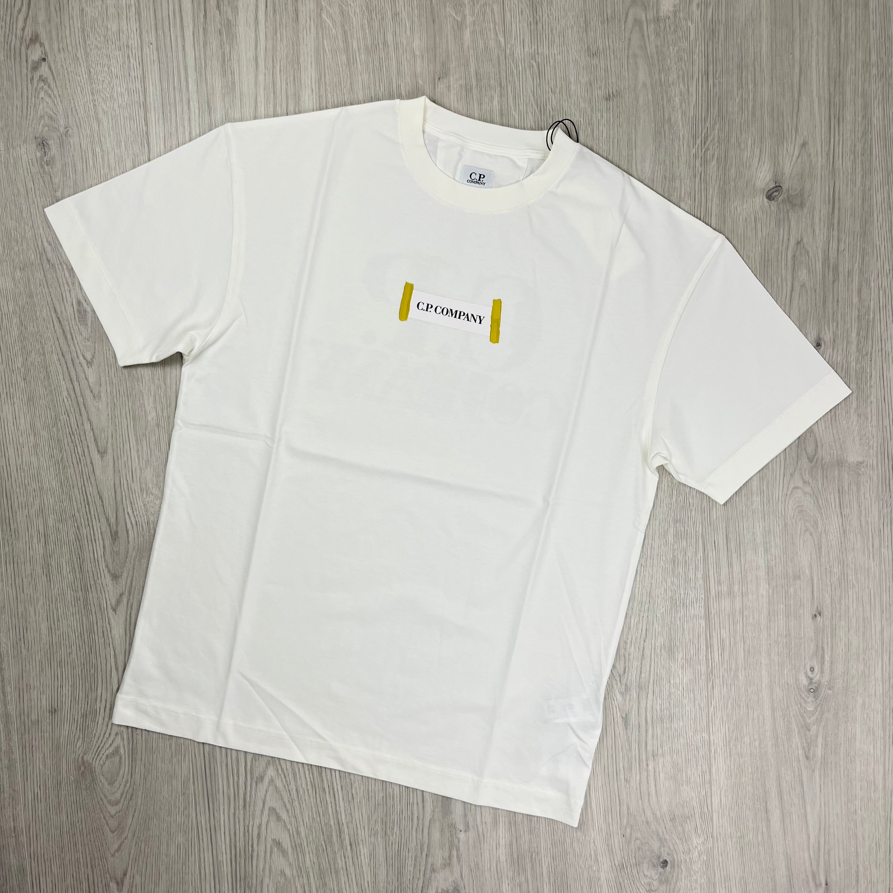 CP Company Blurred Logo T-Shirt in Gauze White. On sale at Open Attire.