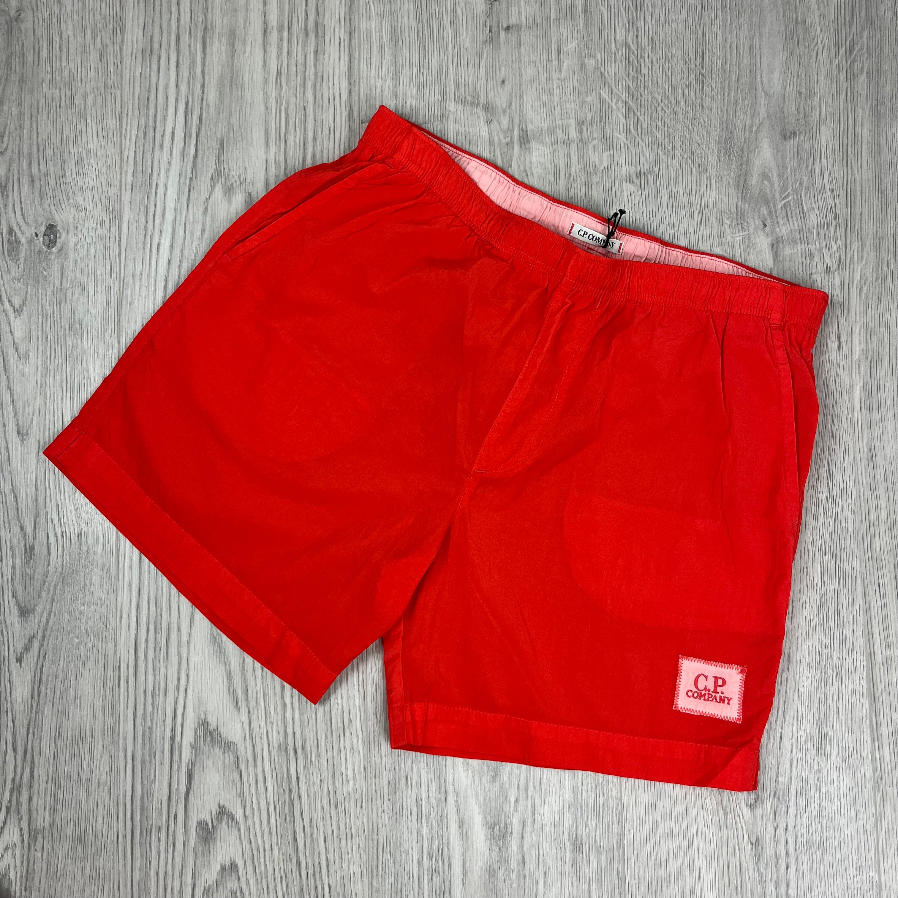 CP Company Chrome-R Swim Shorts in Poinciana. On sale at Open Attire.
