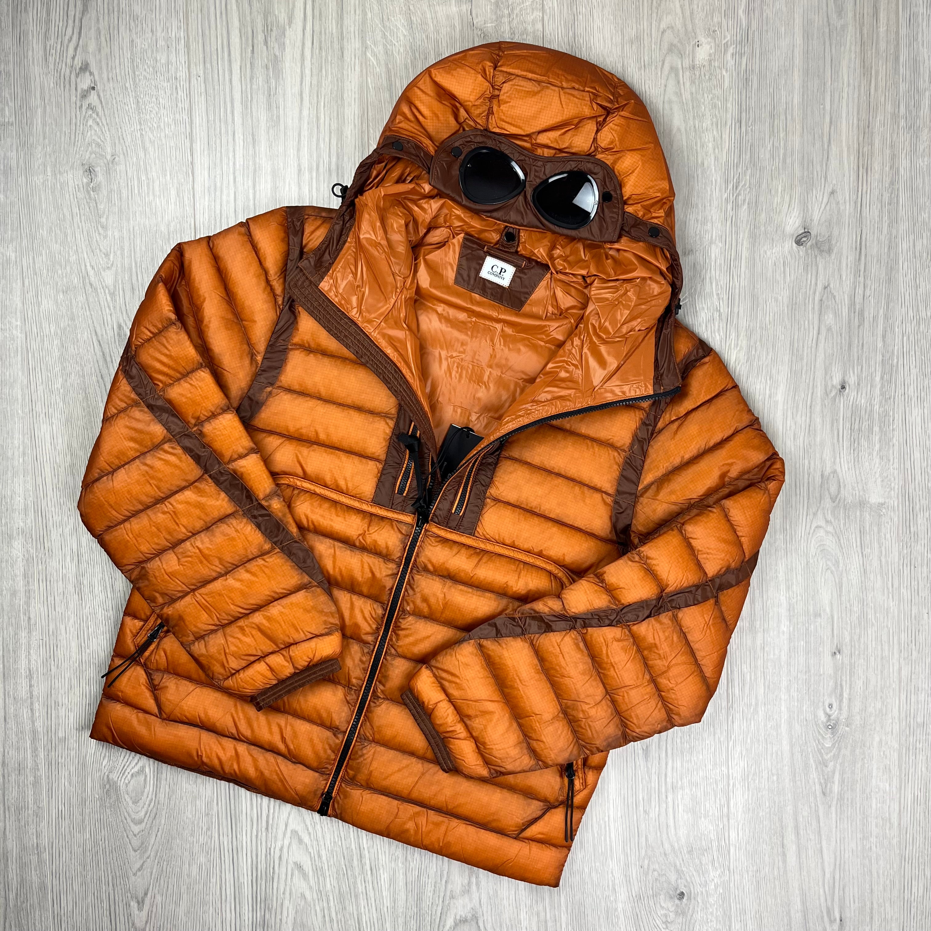 CP Company D.D. Shell Goggle Down Jacket in Bombay Brown. On sale at Open Attire.