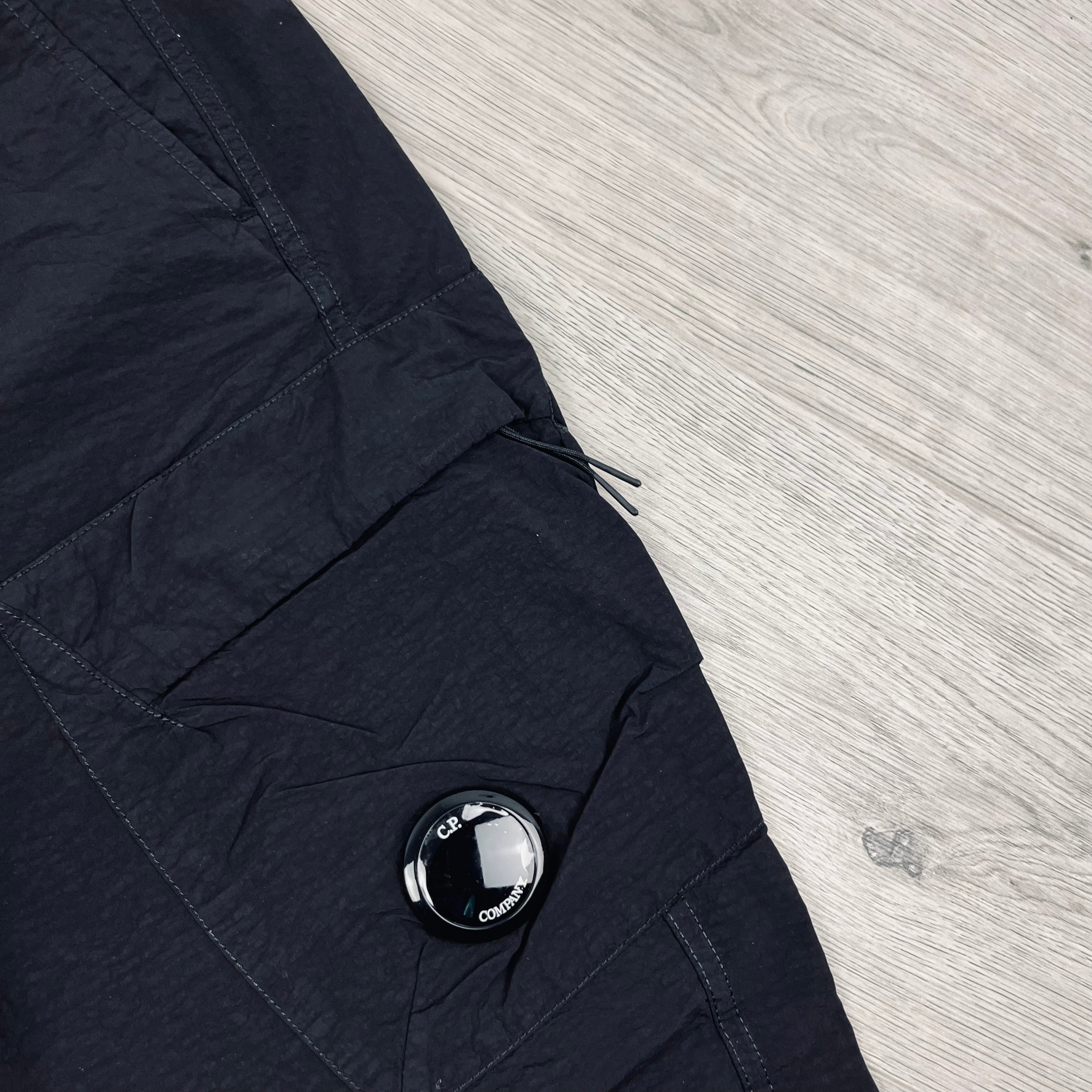 CP Company Flatt Nylon Cargo Trousers in Black. On sale at Open Attire.