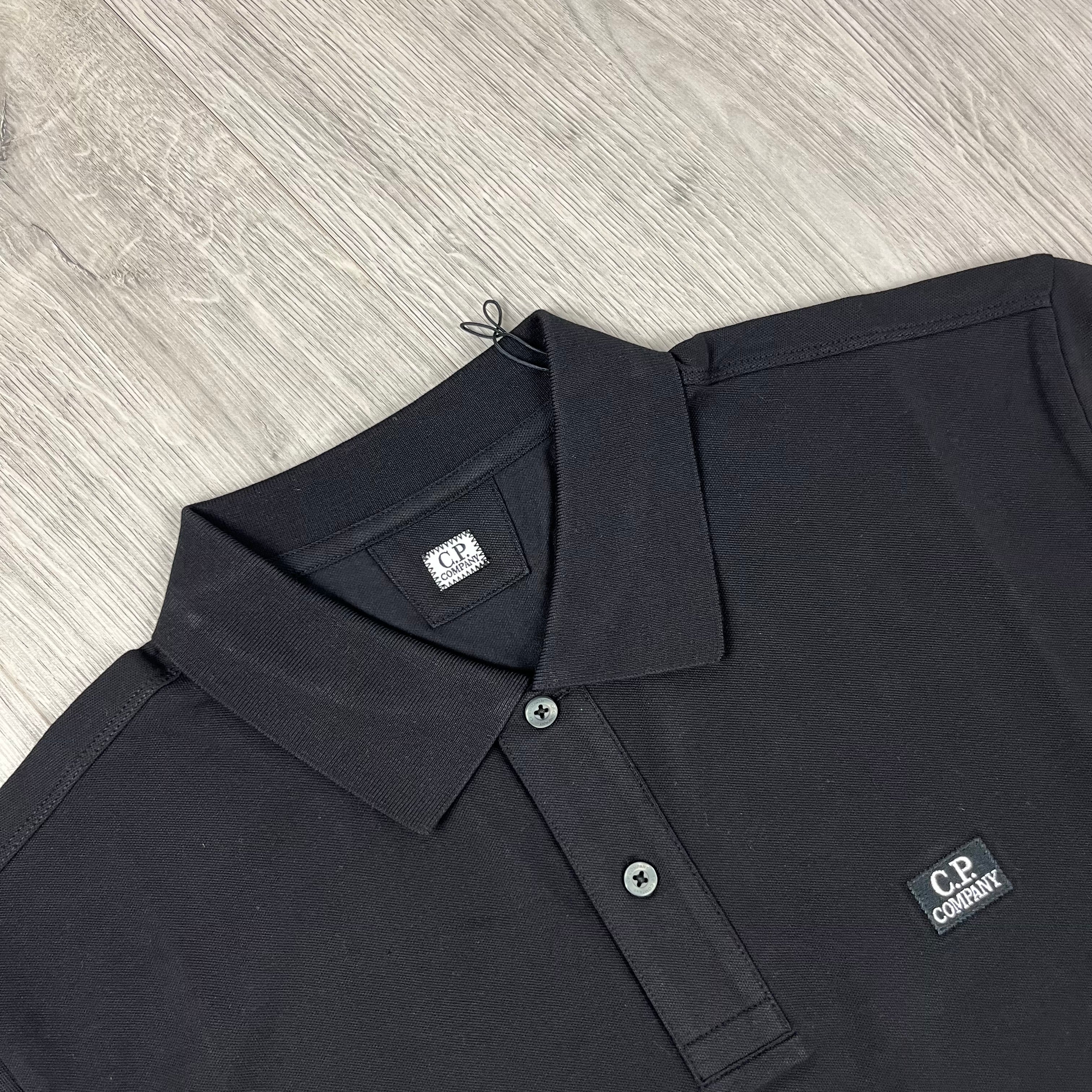 CP Company Long-sleeve Polo Shirt in Black. On sale at Open Attire.