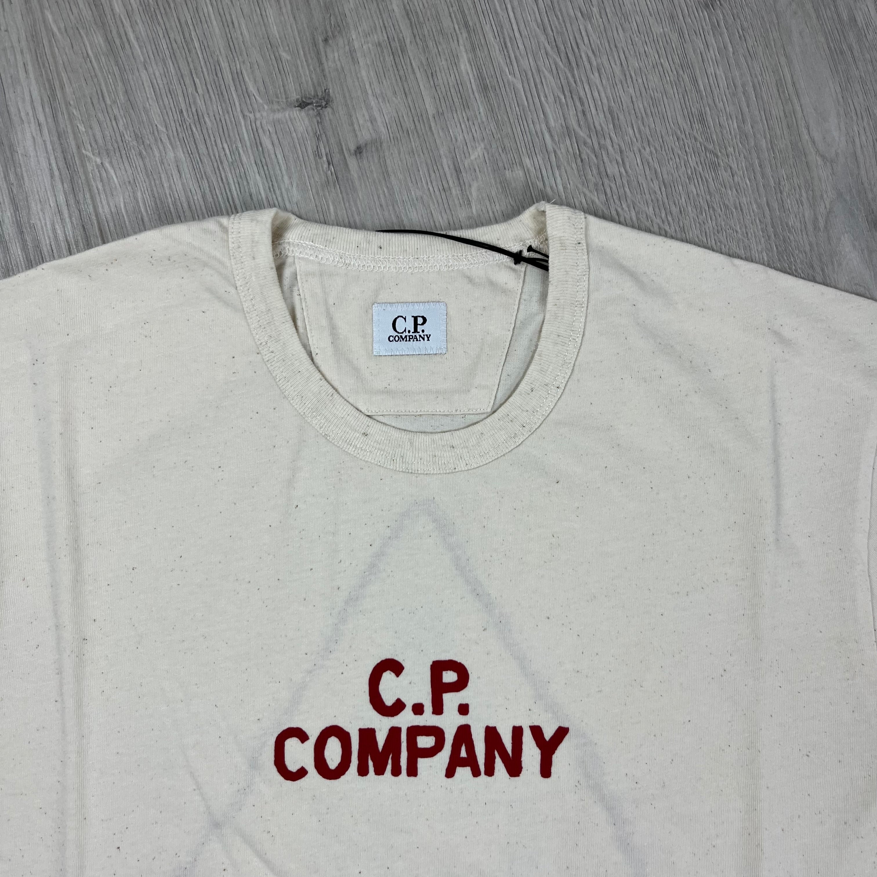 CP Company Natural Jersey T-Shirt in Pistachio Shell. On sale at Open Attire.