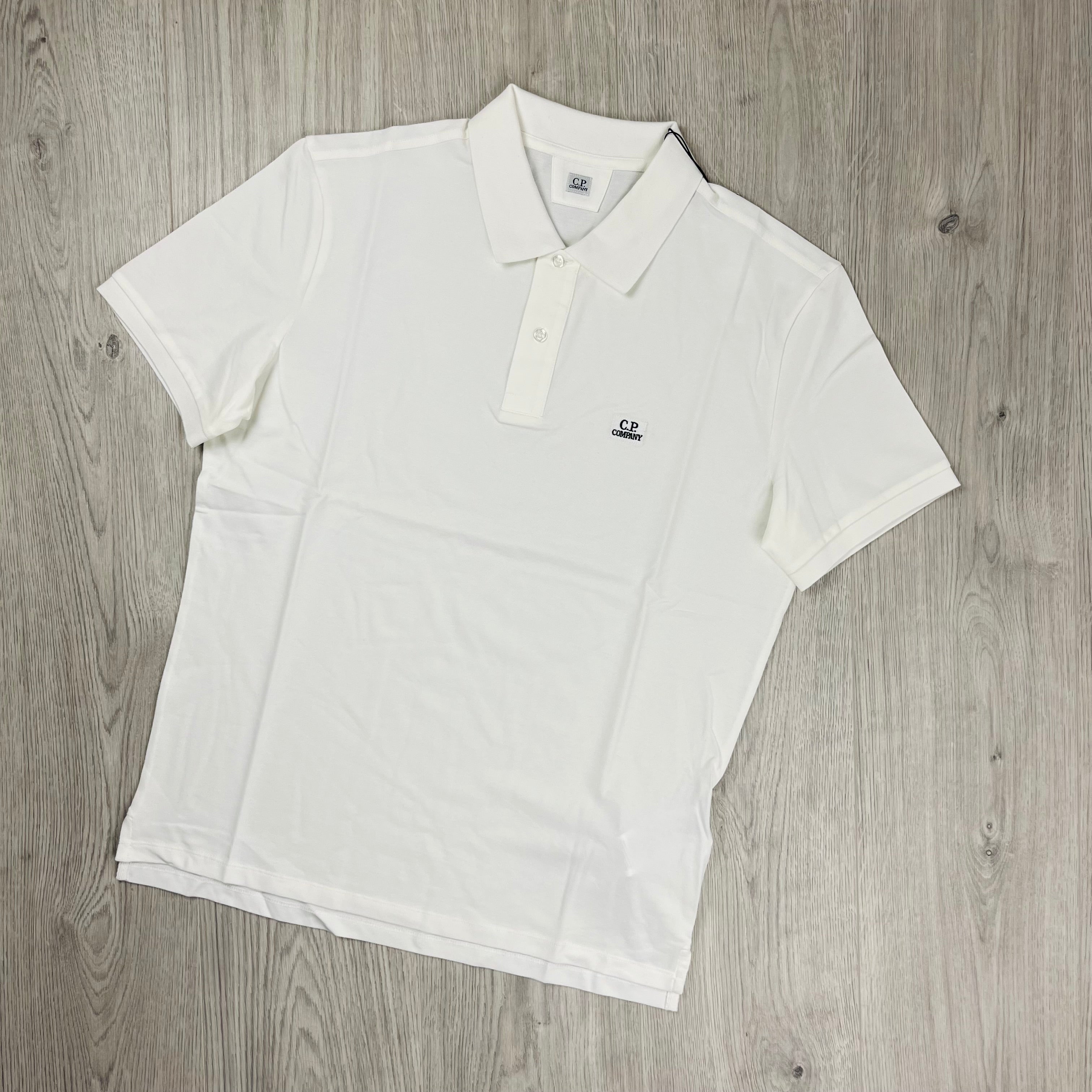 CP Company Polo Shirt in White. On sale at Open Attire.