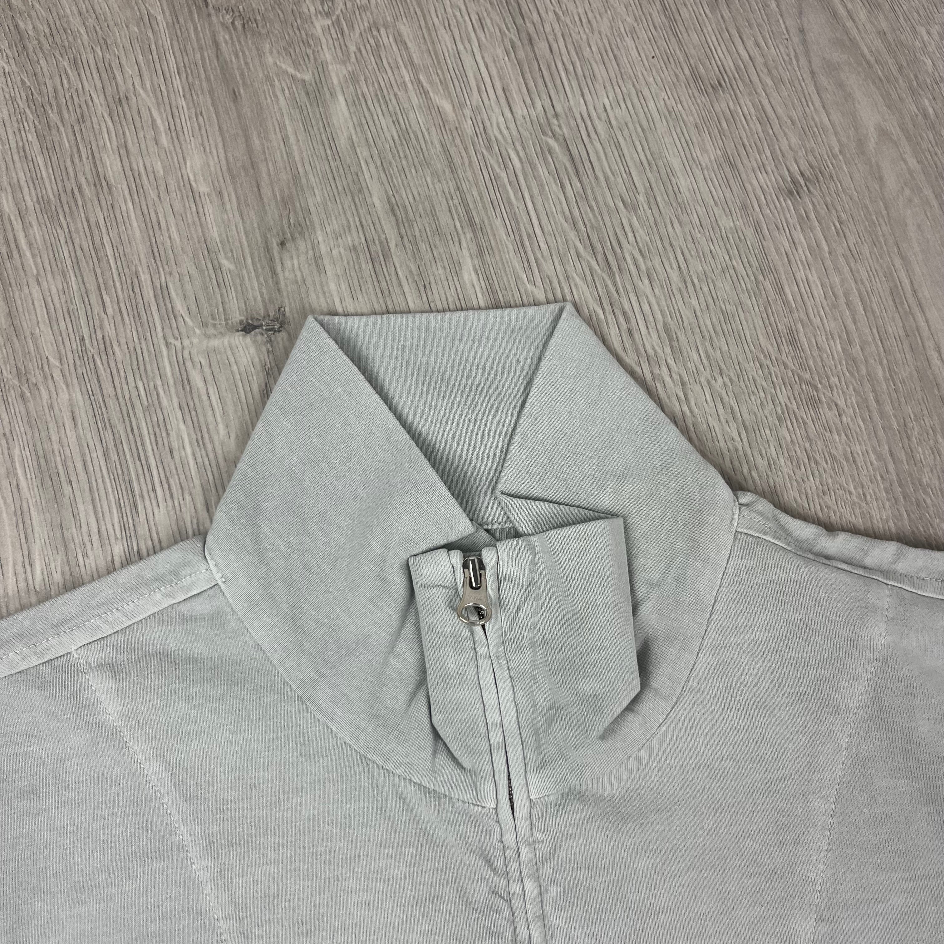 CP Company 1020 Zip Polo Shirt in Blue Fox. On sale at Open attire.