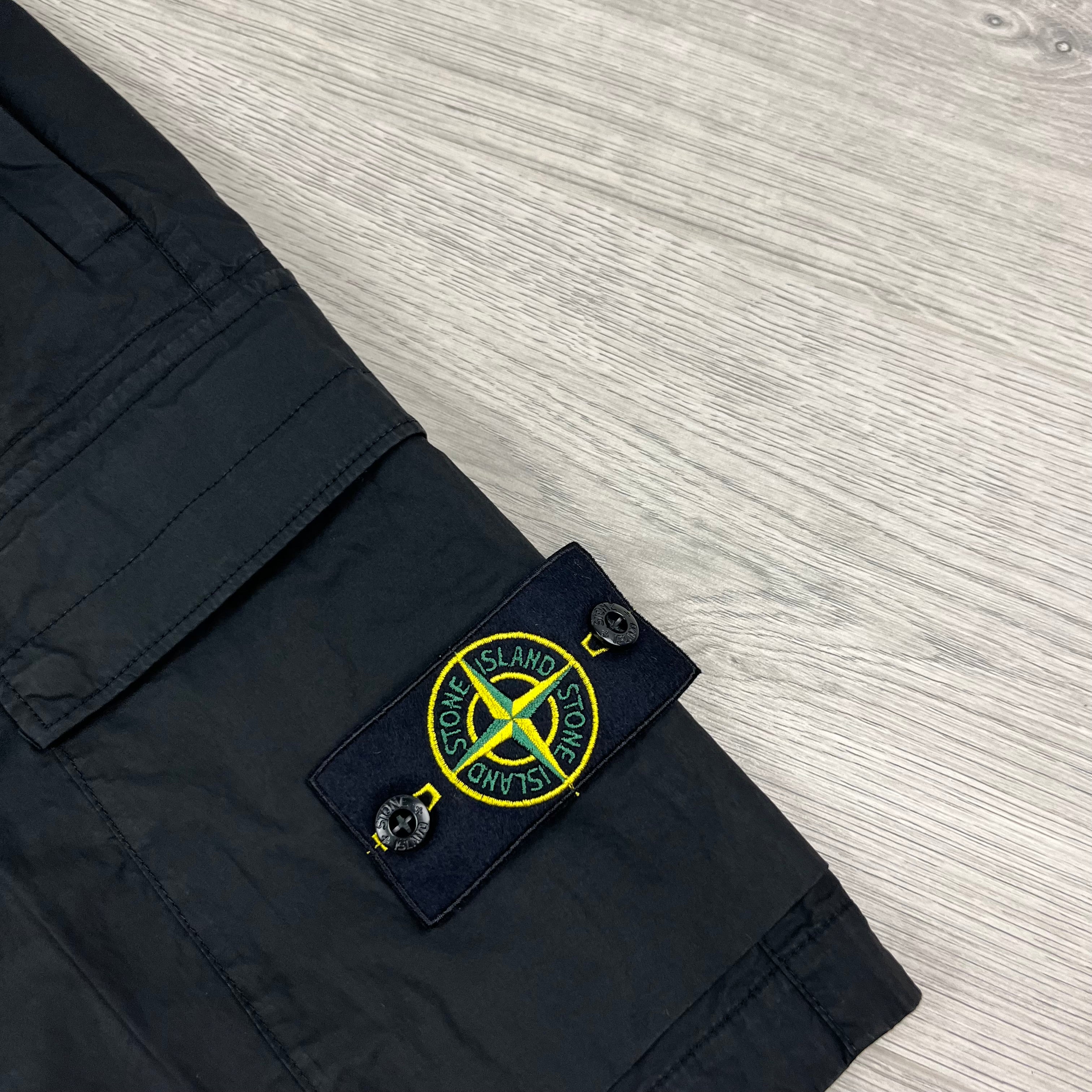 Stone Island Bermuda Cargo Shorts in Black. On sale at Open Attire.