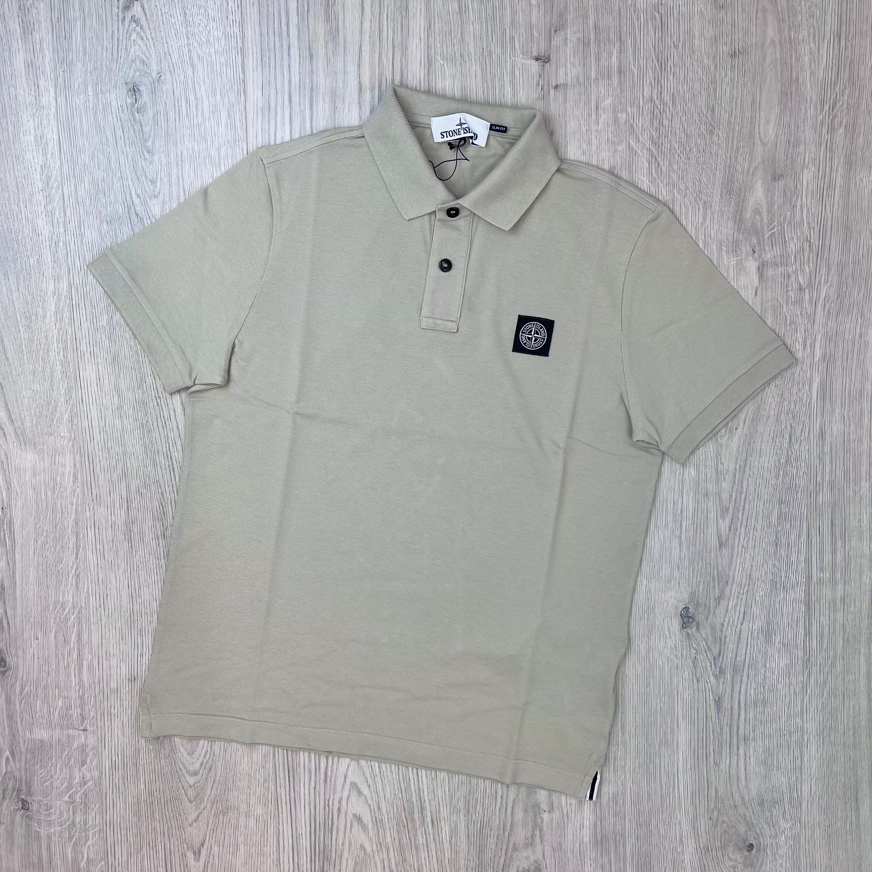Front view of the Stone Island Patch Polo Shirt in Sand.