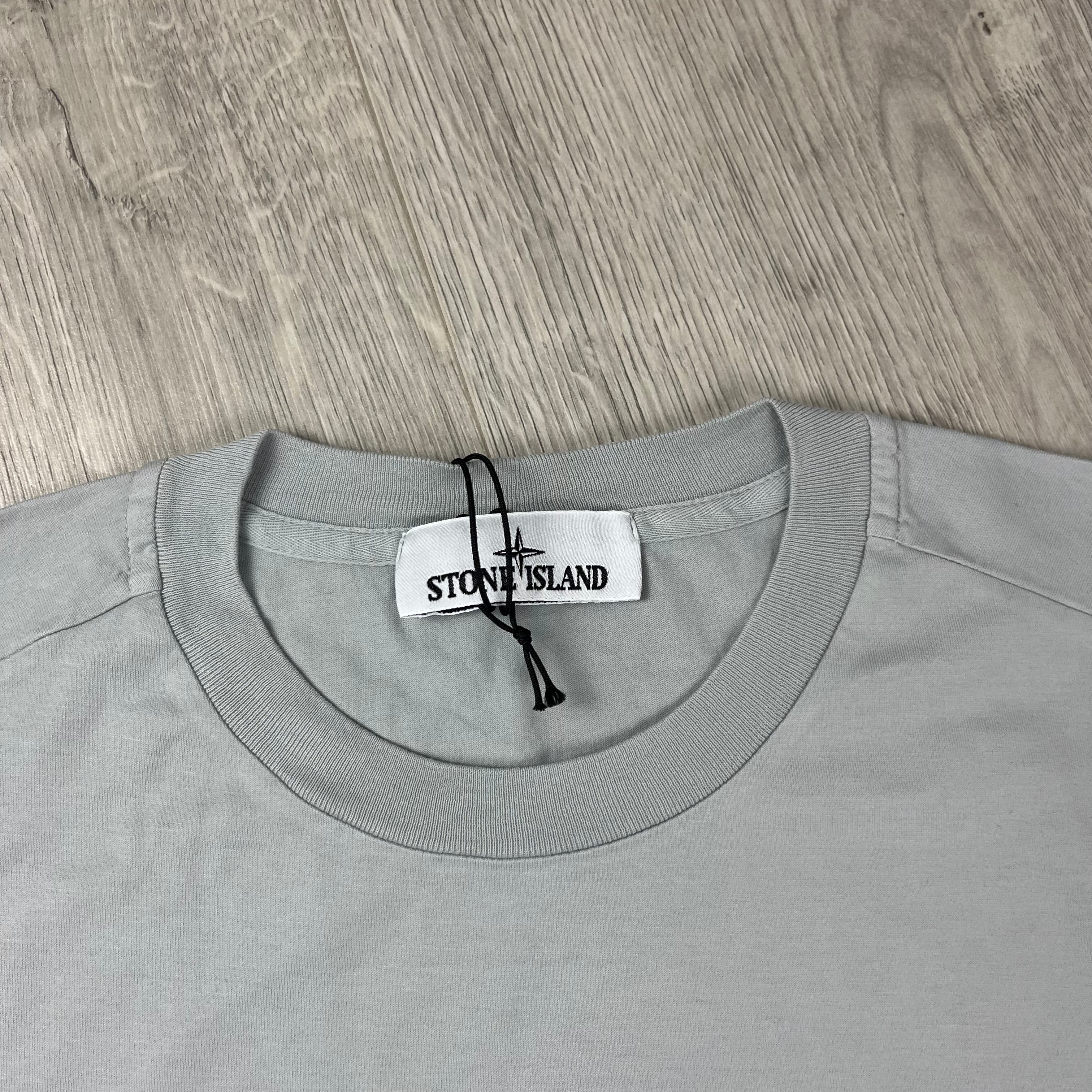 Stone Island 60/2 Patch Logo T-Shirt in Pearl Grey. On sale at Open Attire.