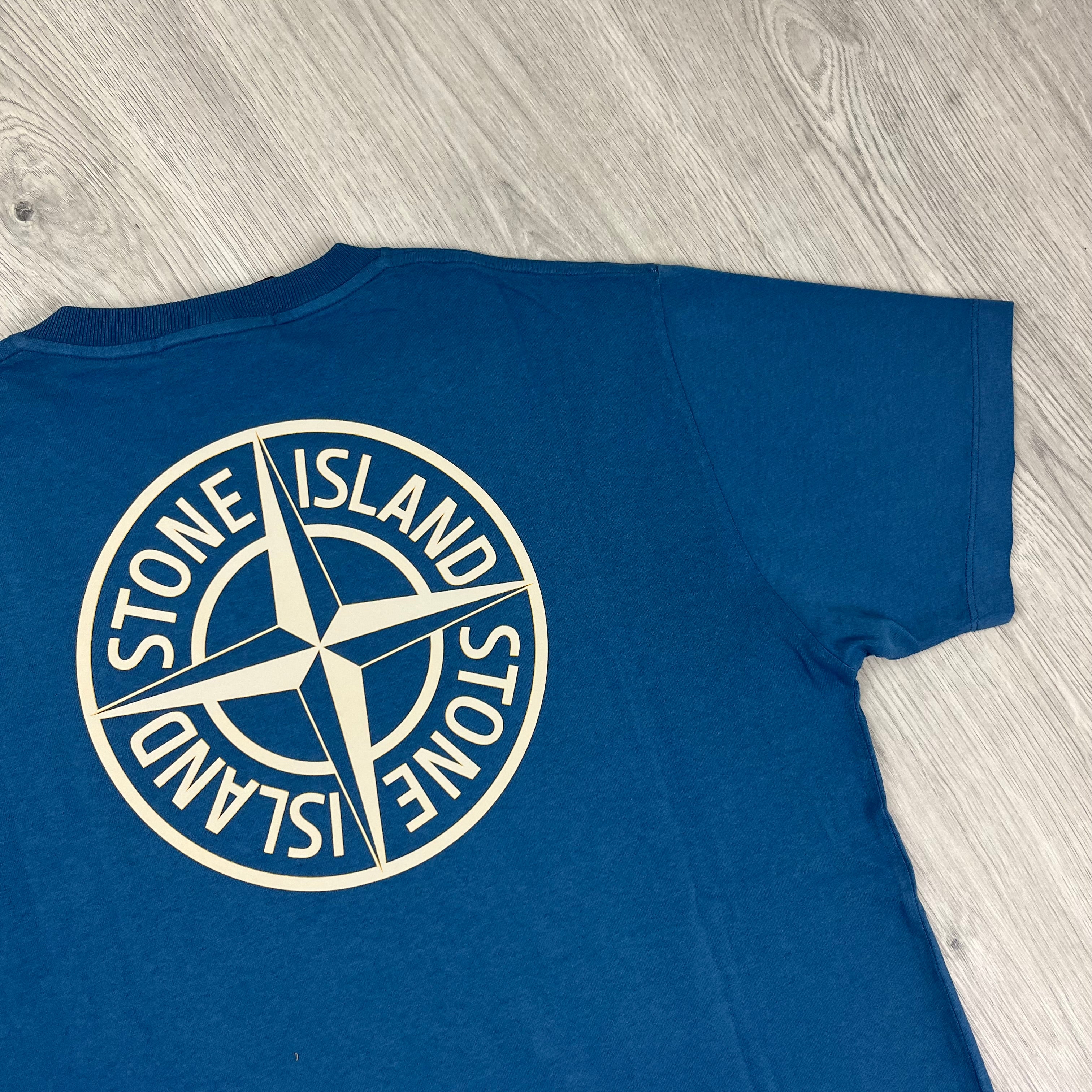 Stone Island 'Institutional Four' T-shirt in Avio Blue. On sale at Open Attire.