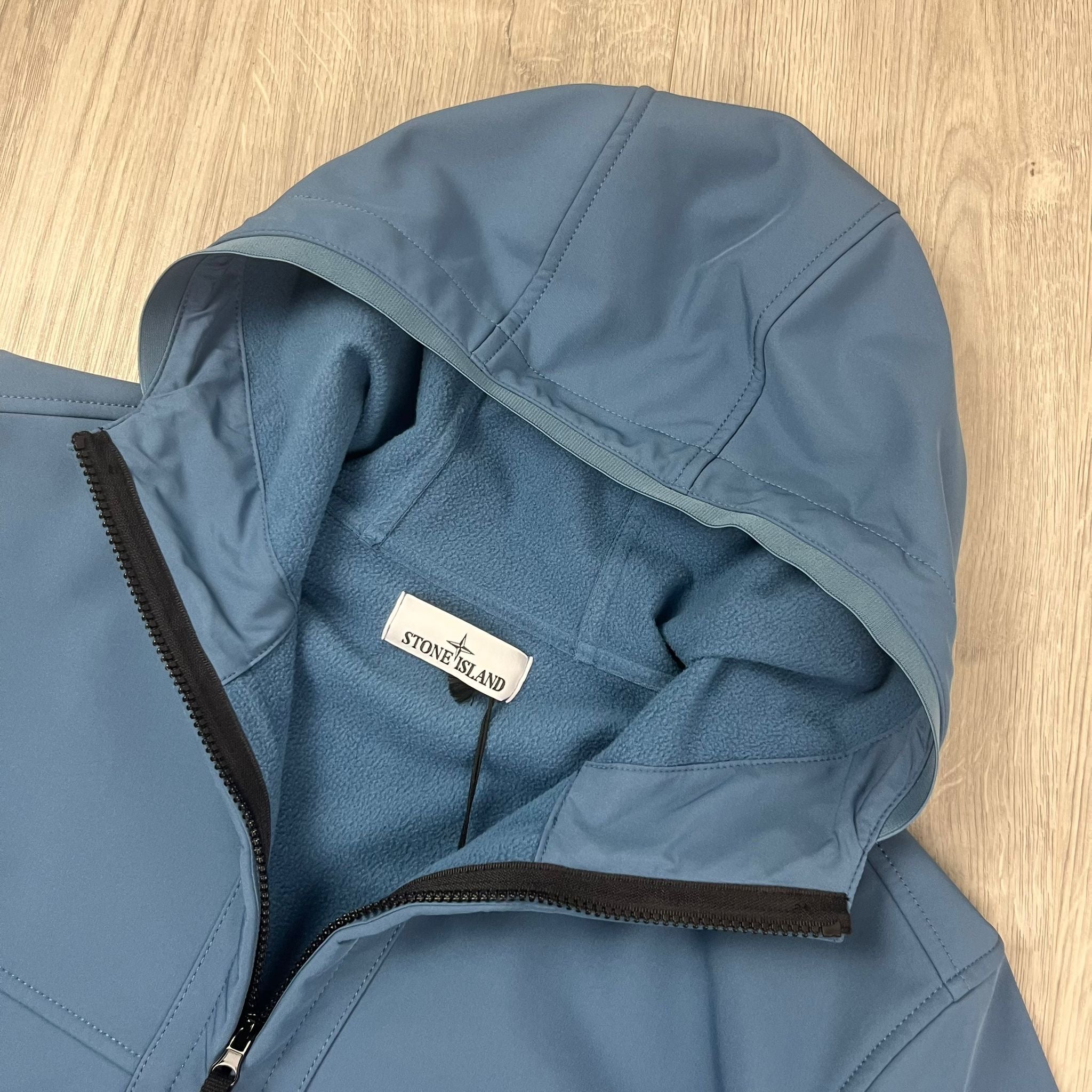 Stone Island Shell R e.dye Jacket in Avio Blue. On sale at Open Attire.