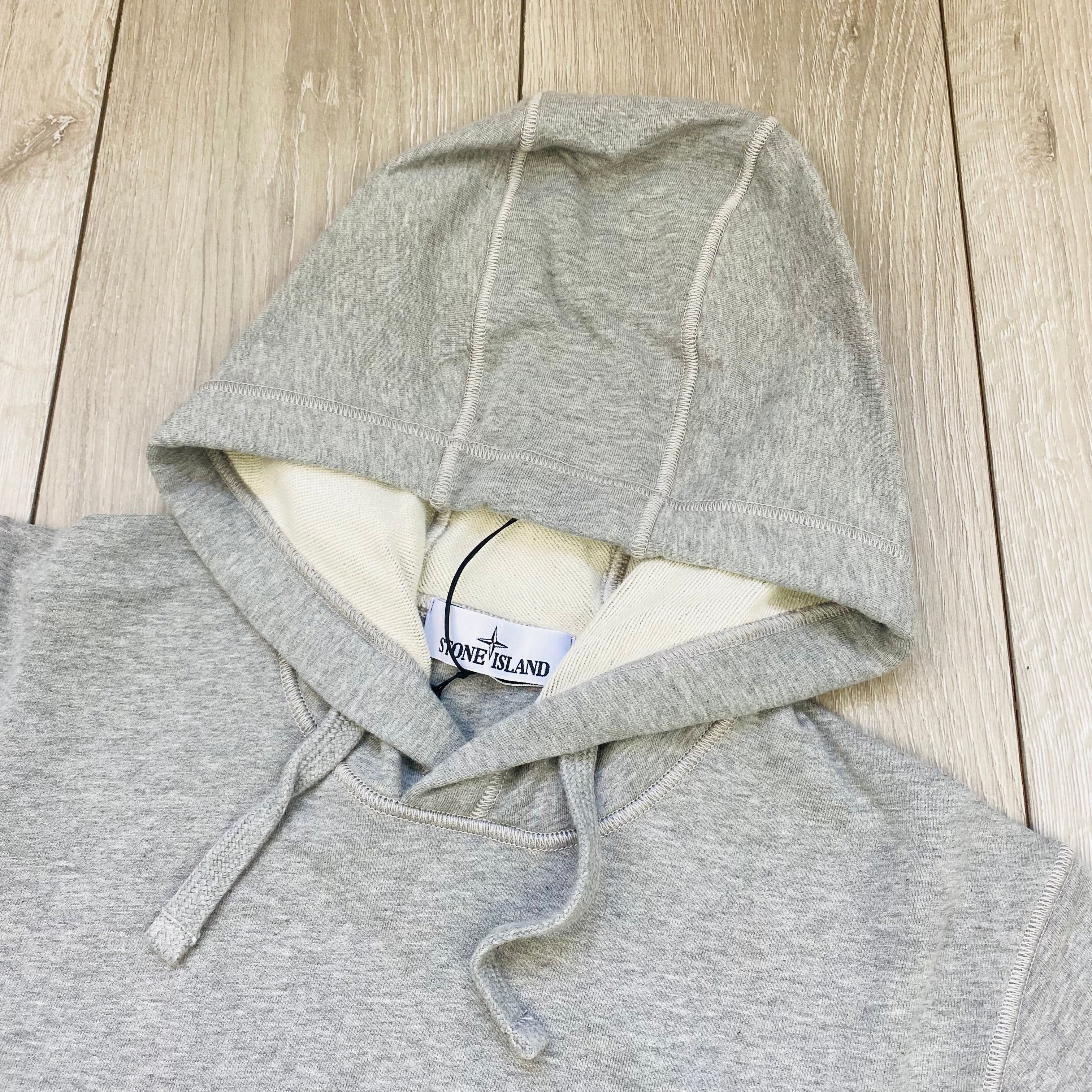 Stone Island Pullover Hoodie in Dust Grey Melange. On sale at Open Attire.